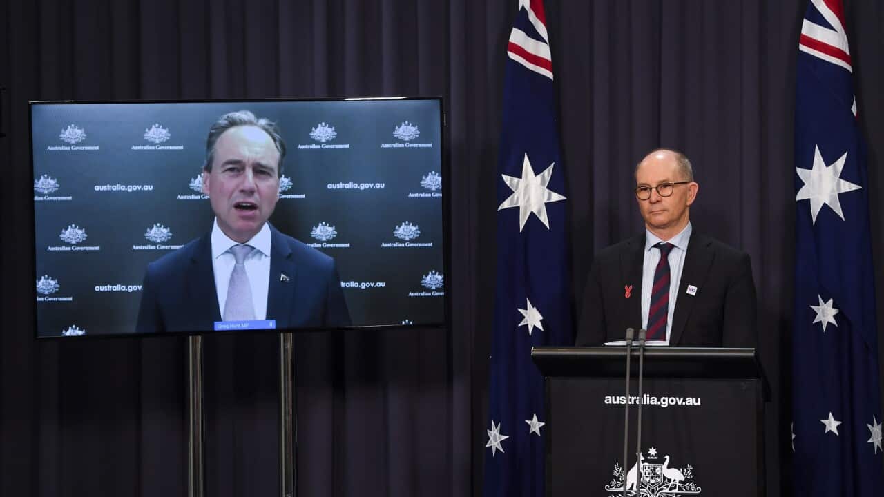 Australian Health Minister Greg Hunt (left) and Professor Paul Kelly