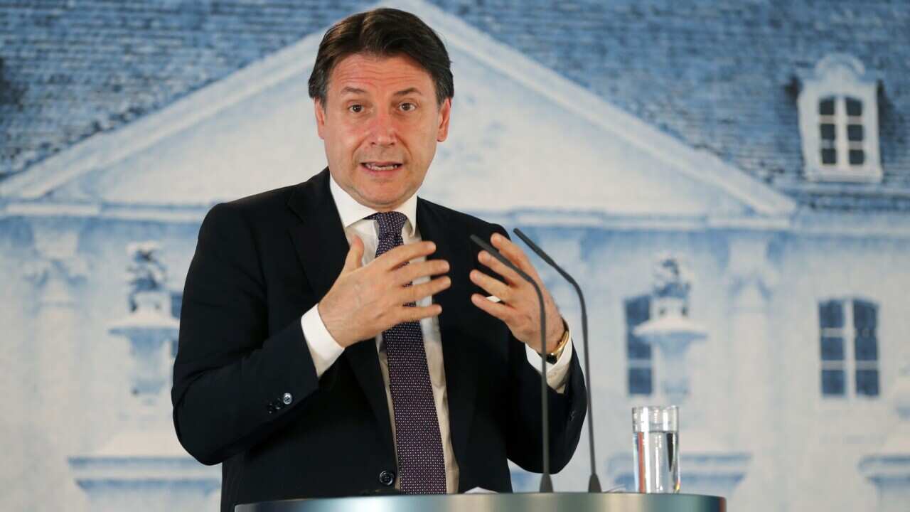 Italian Prime Minister Giuseppe Conte speaks during a press conference with the German Chancellor (unseen) after their meeting in Meseberg