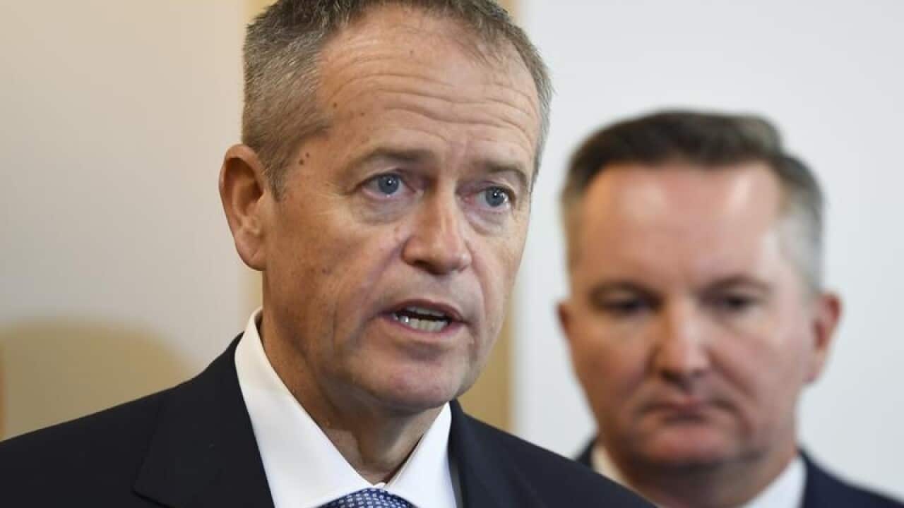 Opposition Leader Bill Shorten (L)