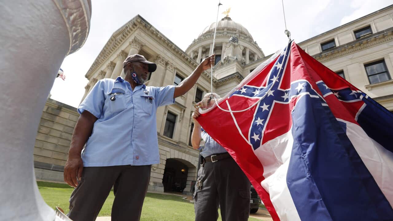 The Mississippi government is retiring the Confederate battle standard from the state flag