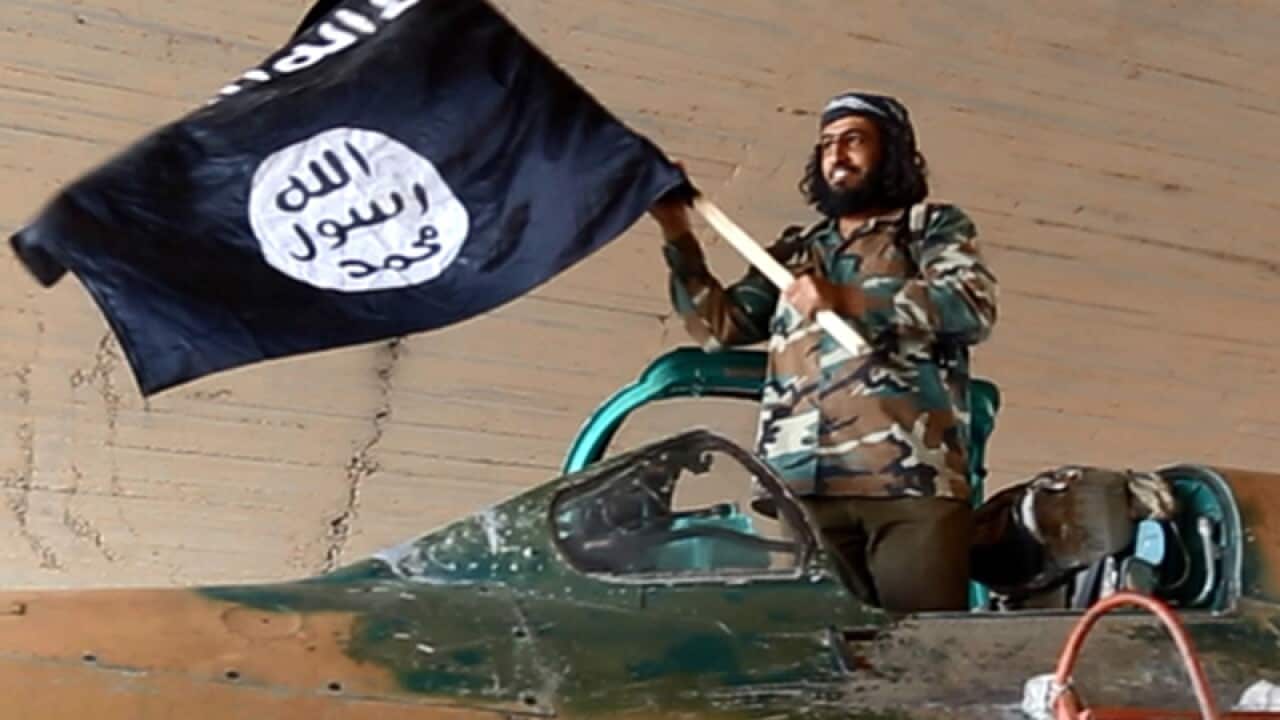 A fighter of the Islamic State inside the Tabqa air base