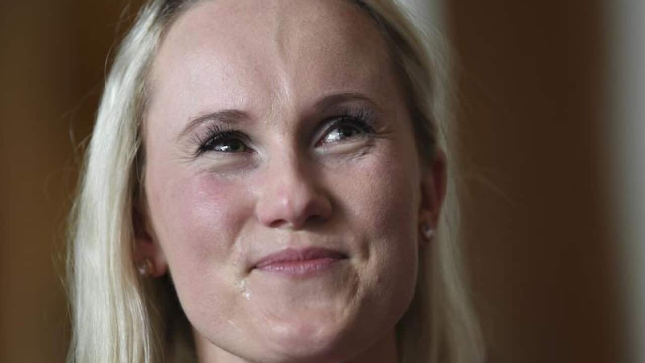 White Ribbon Ambassador Angela Jay reacts