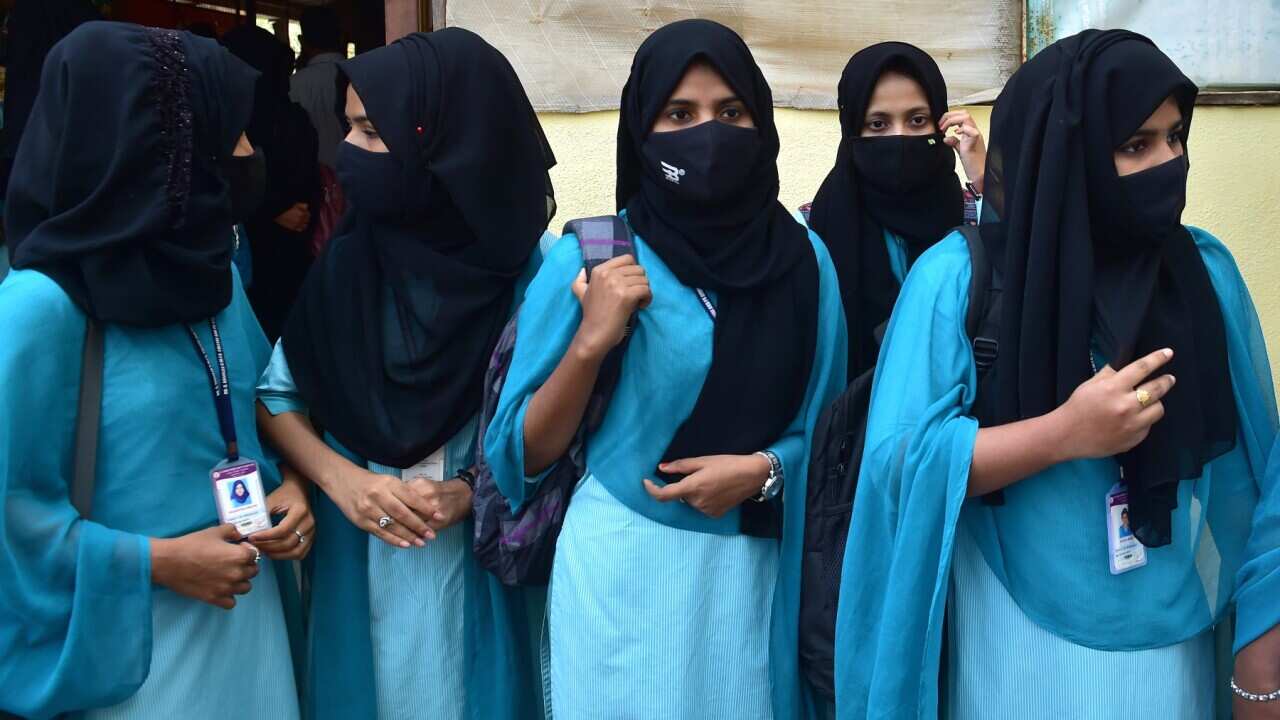 Indian Muslim students leave after not being allowed to enter the pre-university colleges while wearing Hijab in Karnataka on 16 February 2022. (file)