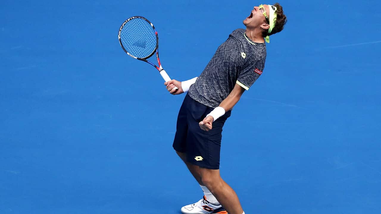 Uzbekistan's Denis Istomin celebrates his win