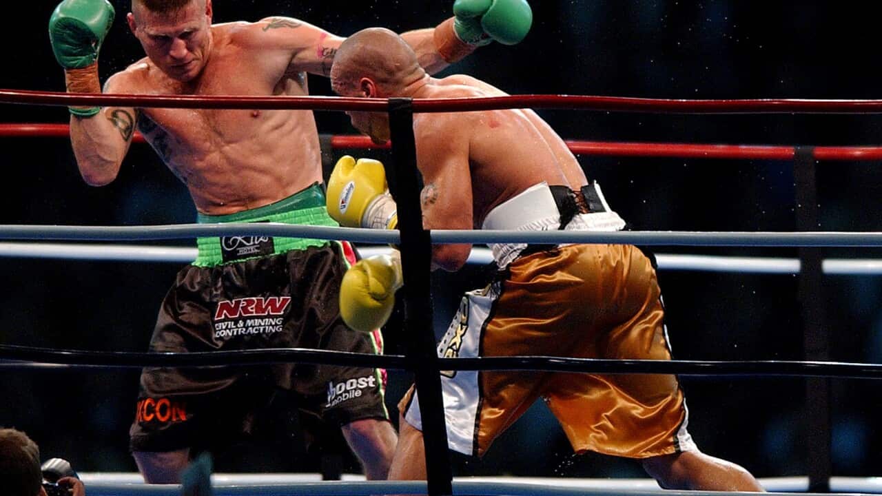 Anthony Mundine in action against Danny Green, Mundine went on to win in a points decision at Aussie Stadium. Wednesday, May 17, 2006.