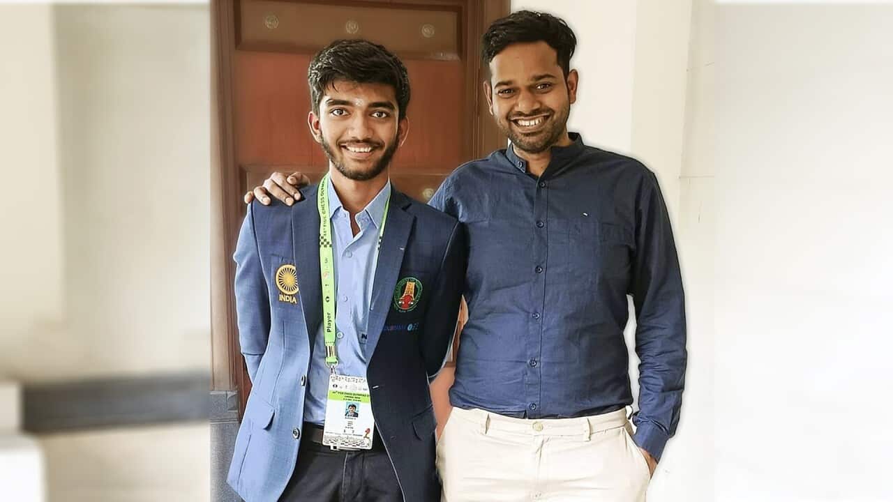 Chess grandmaster and coach Vishnu Prasanna Vasanthan Perumal (right) with his mentee and the youngest undisputed World Chess Champion in the history of the game, Gukesh Dommaraju (left).