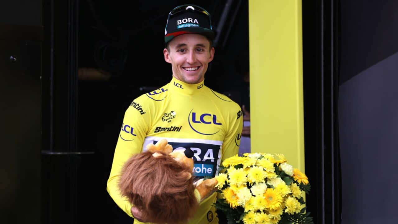 Jai Hindley (BORA-Hansgrohe) reacts while wearing the yellow jersey at the Tour de France