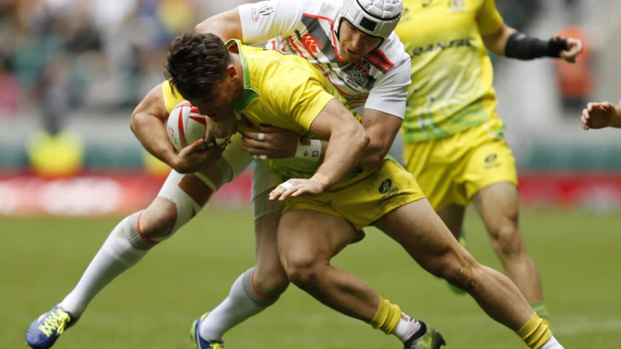 Australia's Simon Kennewell and England's Phil Burgess