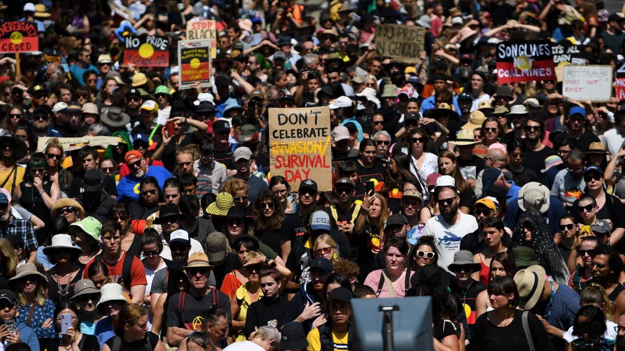 Protesters are seen during the Invasion Day rally in Melbourne last year.