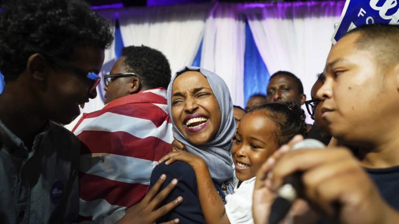 Ilhan Omar celebrates with her children after her Congressional victory.