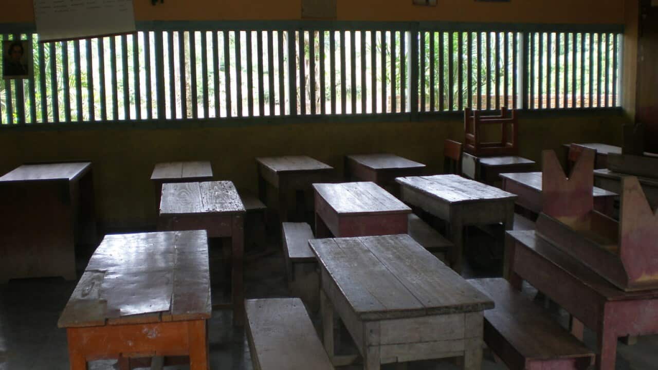 Empty desks in a classroom