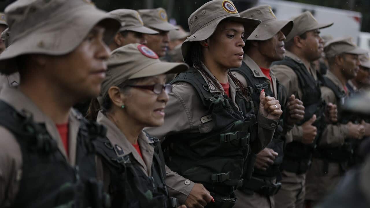 Civilian militias march during military exercises in Caracas, Venezuela.