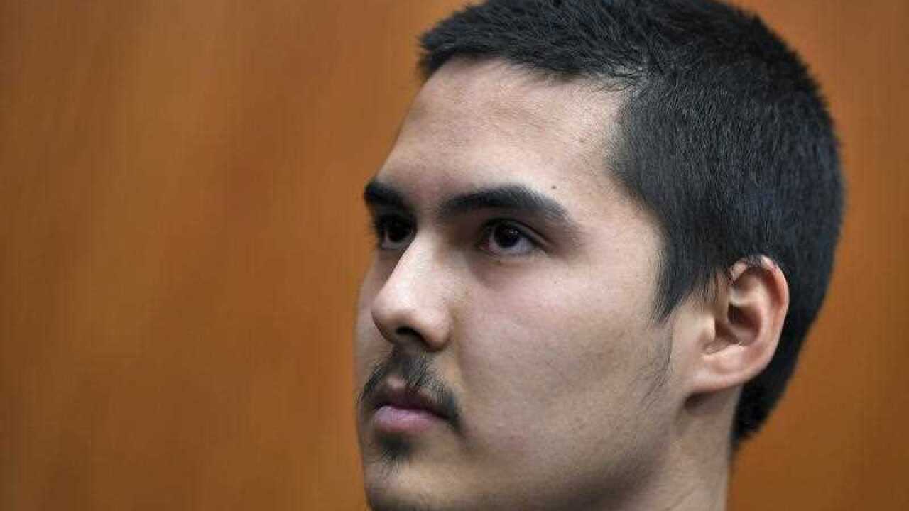 John Zakhariev is calling on the Australian government for help as he faces 8 years' jail for terror-related charges.