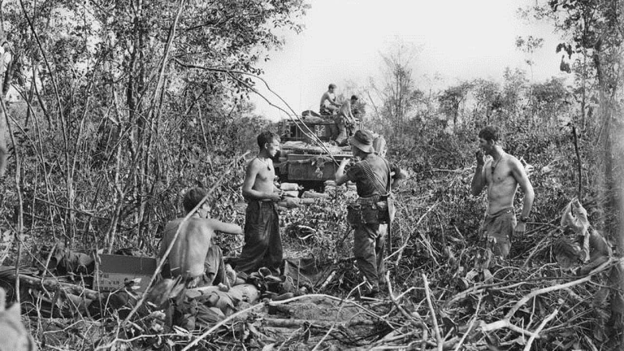A supplied image of Australian soldiers in a wooded area of Vietnam.
