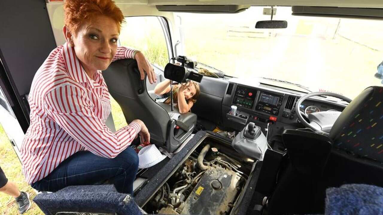 Pauline Hanson looks on as her campaign bus breaks down