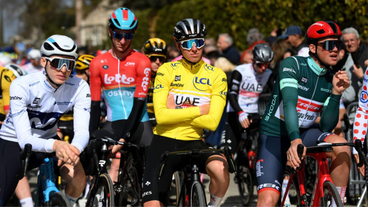 Yellow jersey Tadej Pogacar and the rest of the peloton look on prior to the cancellation of Stage 6 at Paris-Nice