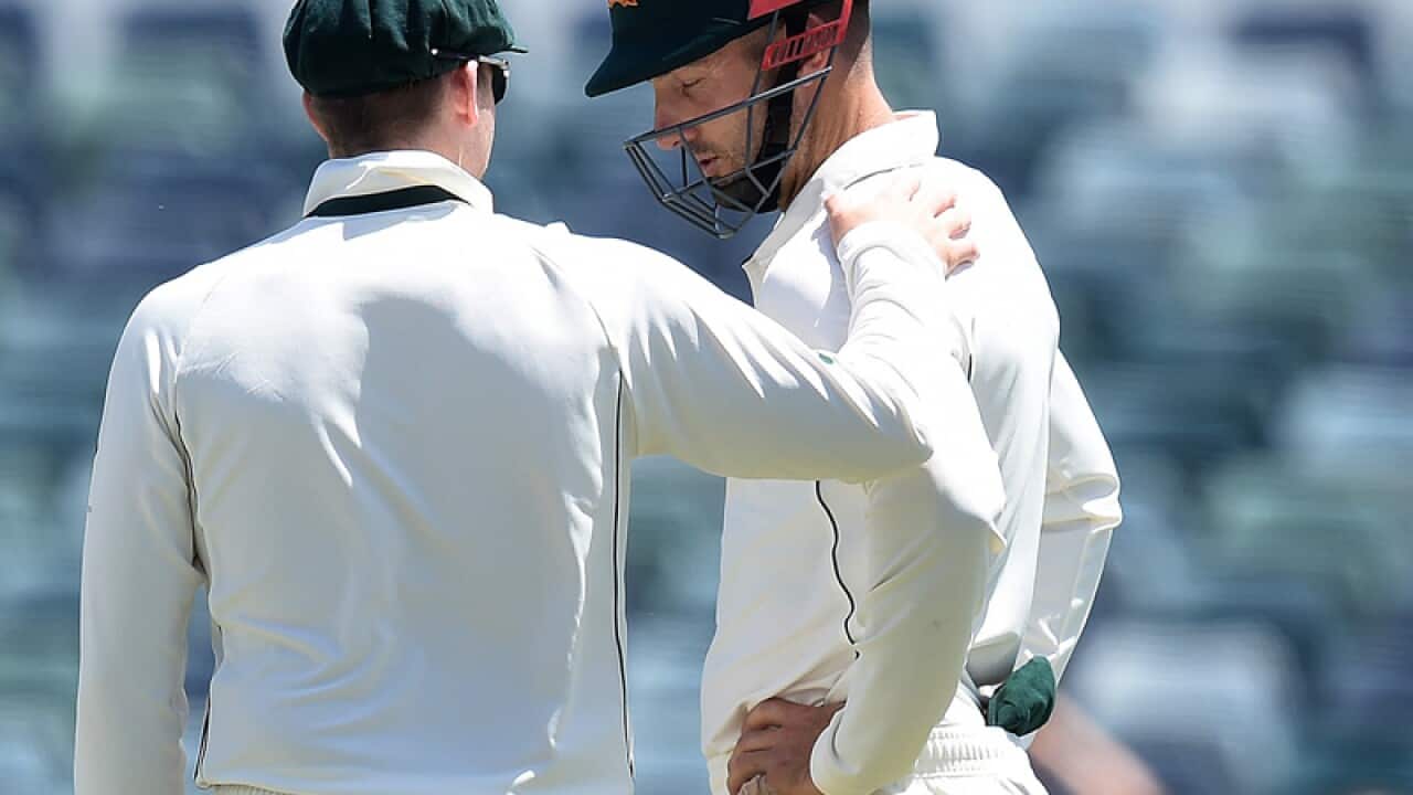 Australian cricketer Shaun Marsh is seen with his finger bandaged