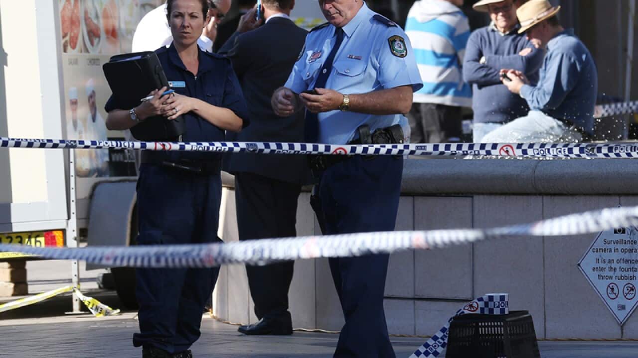 Police officers at the scene of a shooting at Westfield Hornsby