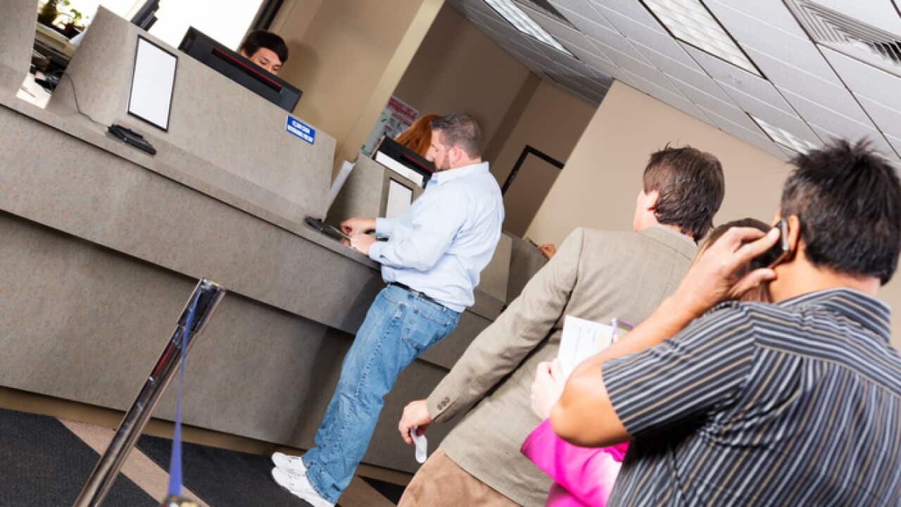 Line of customers at the bank
