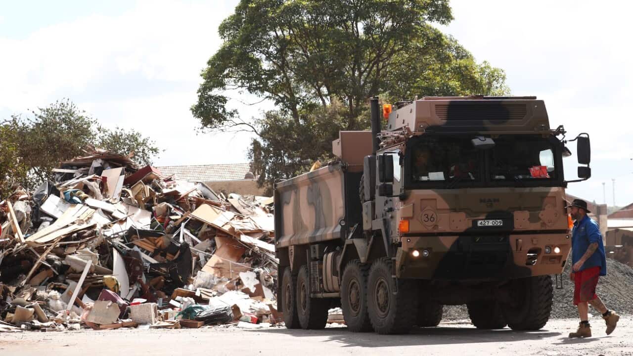 A temporary waste dumping facility in the aftermath of the floods is seen in Central Lismore, northeastern New South Wales, Monday, March 21, 2022. Lismore in the NSW’s northeast was inundated with a record 14.37m flood on February 28.