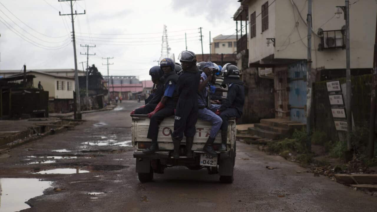 Police officers in Freetown during the Ebola lockdown