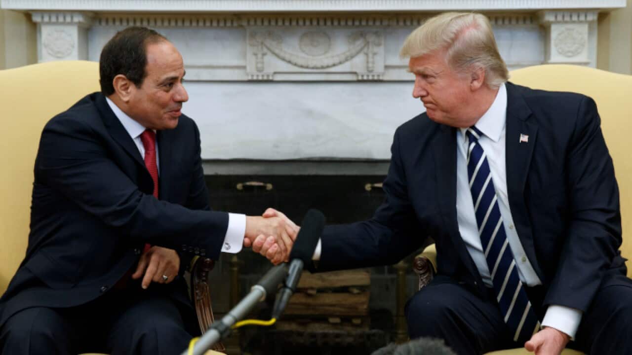 President Donald Trump shakes hands with Egyptian President Abdel Fattah el-Sisi in the Oval Office of the White House in Washington