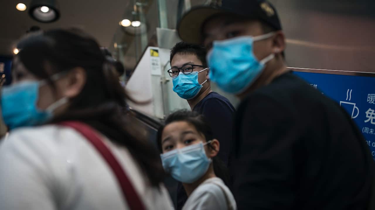 Customers wear protective masks while visiting an IKEA store in Wuhan on 25 April.