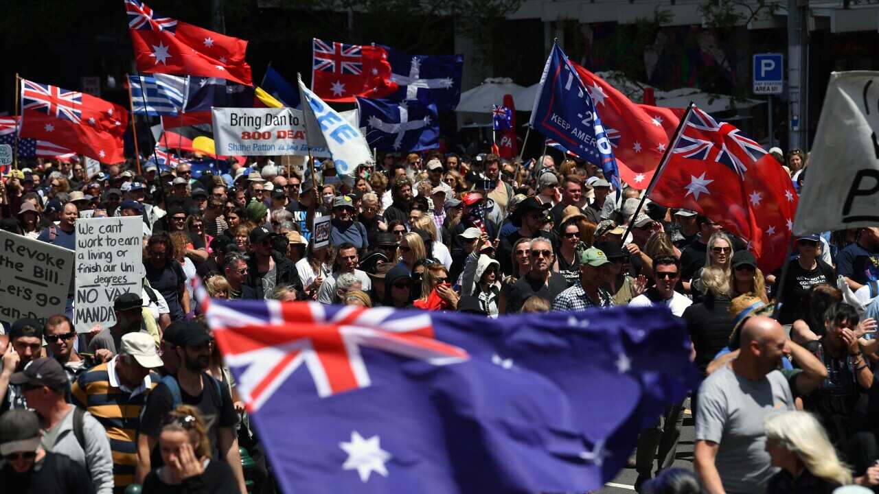 An anti-vaccination protest in Melbourne, December 2021. Far-right extremists have infiltrated such rallies in recent months.