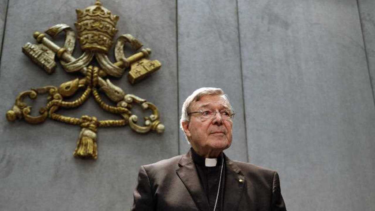 In this Thursday, June 29, 2017. file photo, Cardinal George Pell prepares to make a statement, at the Vatican.