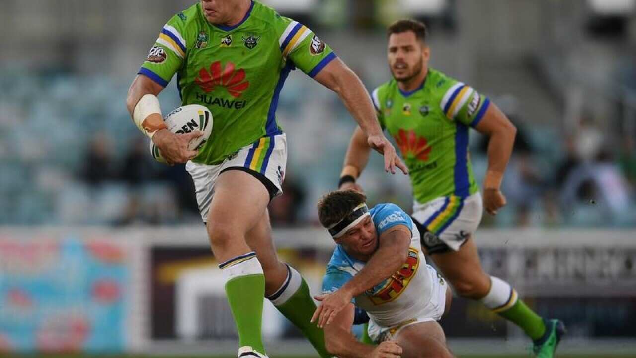 Shannon Boyd of the Raiders is tackled