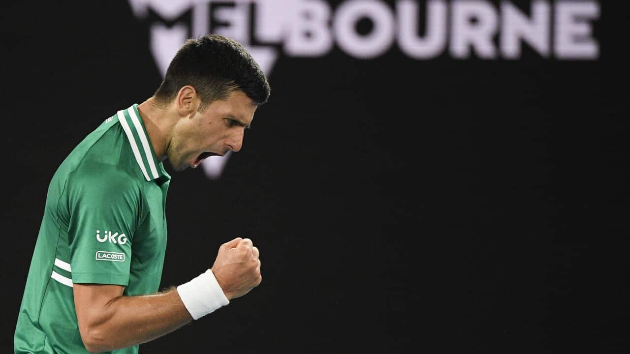 Serbia's Novak Djokovic reacts after winning the third set against Germany's Alexander Zverev at the Australian Open tennis championship in Melbourne, Australia, Tuesday, Feb. 16, 2021.(AP Photo/Andy Brownbill)