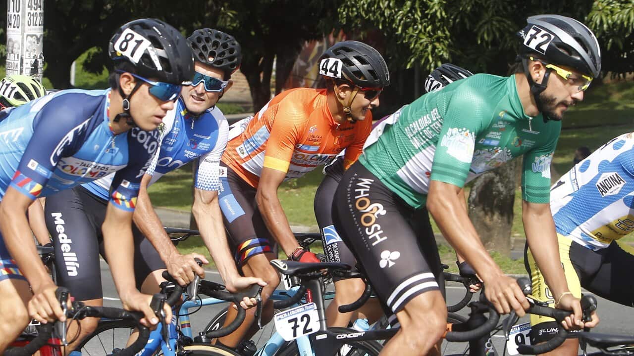 Colombian cyclist Diego Camargo (C-44 helmet)