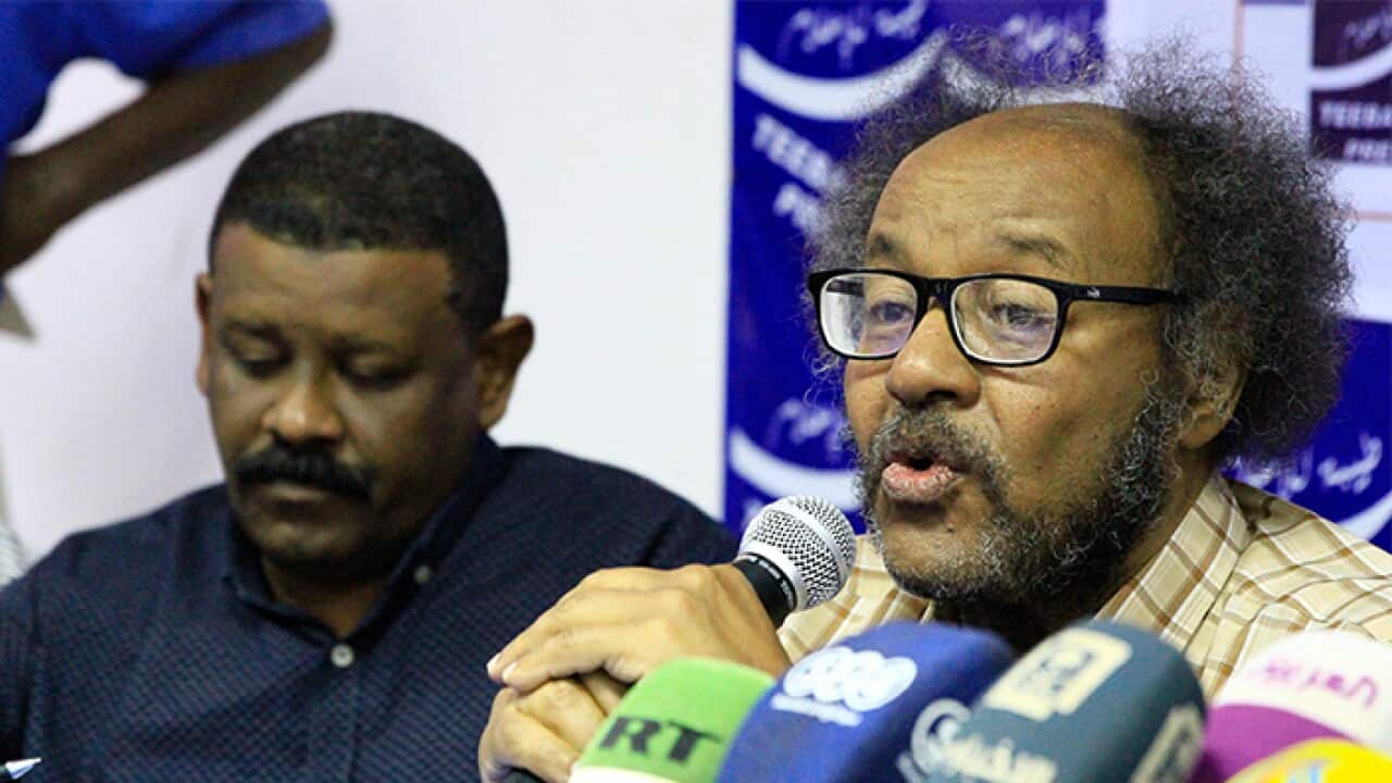 Sudanese activist Muawia Hamed Shaddad (R), one of the leaders of the opposition Alliance for Freedom and Change movement