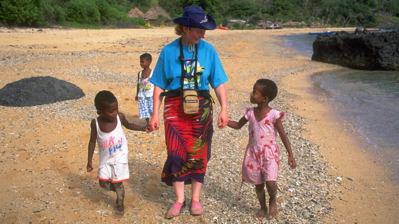 Tourist With Fijian Children