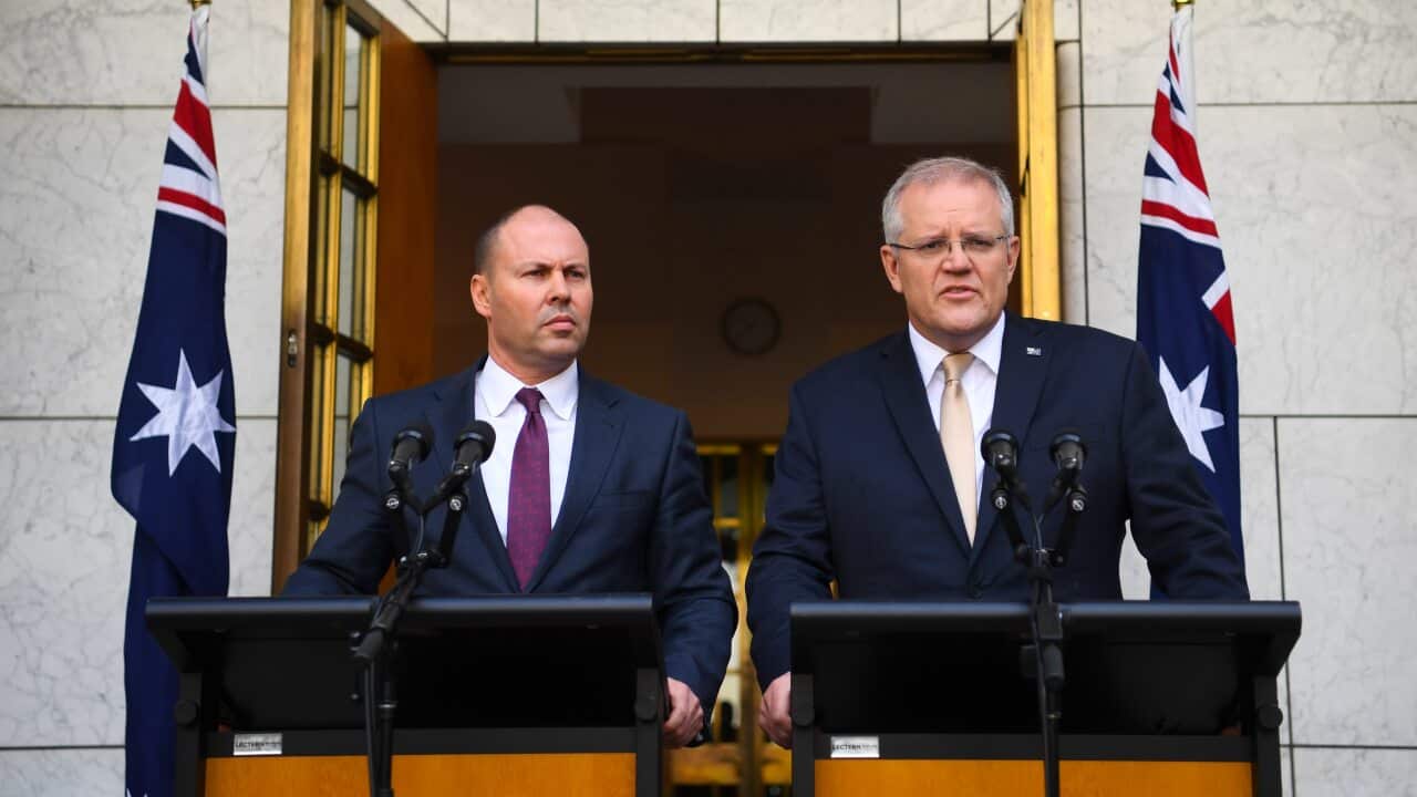 Australian Prime Minister Scott Morrison (right) and Australian Treasurer Josh Frydenberg speak to the media during a press conference at Parliament House in Canberra, Thursday, March 12, 2020. (AAP Image/Lukas Coch) NO ARCHIVING