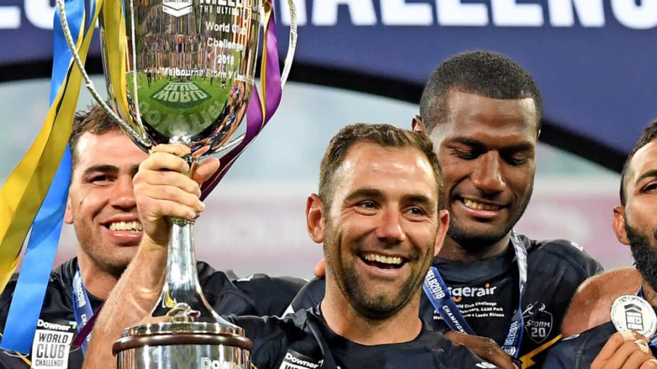 Melbourne Storm captain Cameron Smith lifts the World Club Challenge Trophy