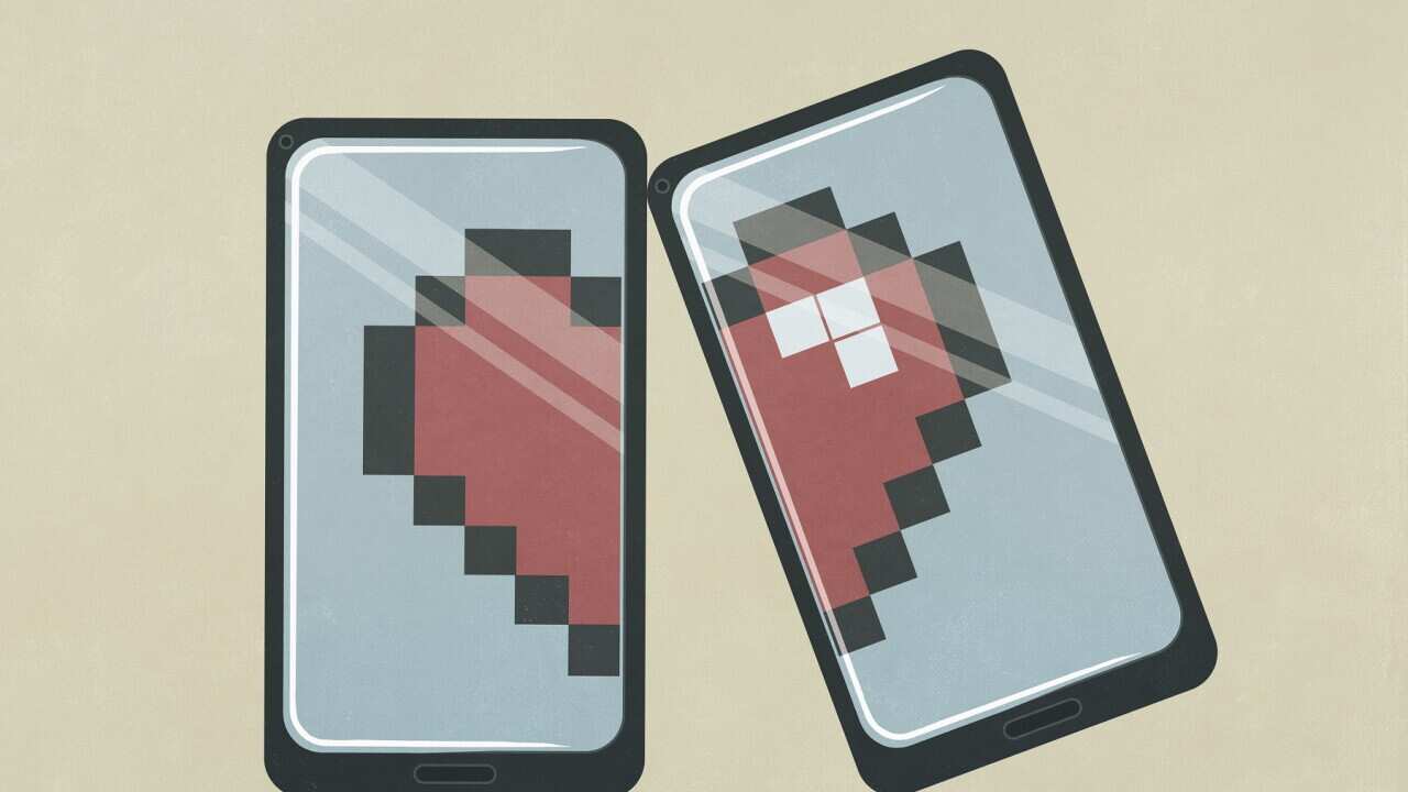 Pixelated broken heart on smart phone screens