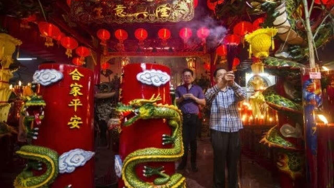 A man celebrates Imlek in Surabaya - March 2017