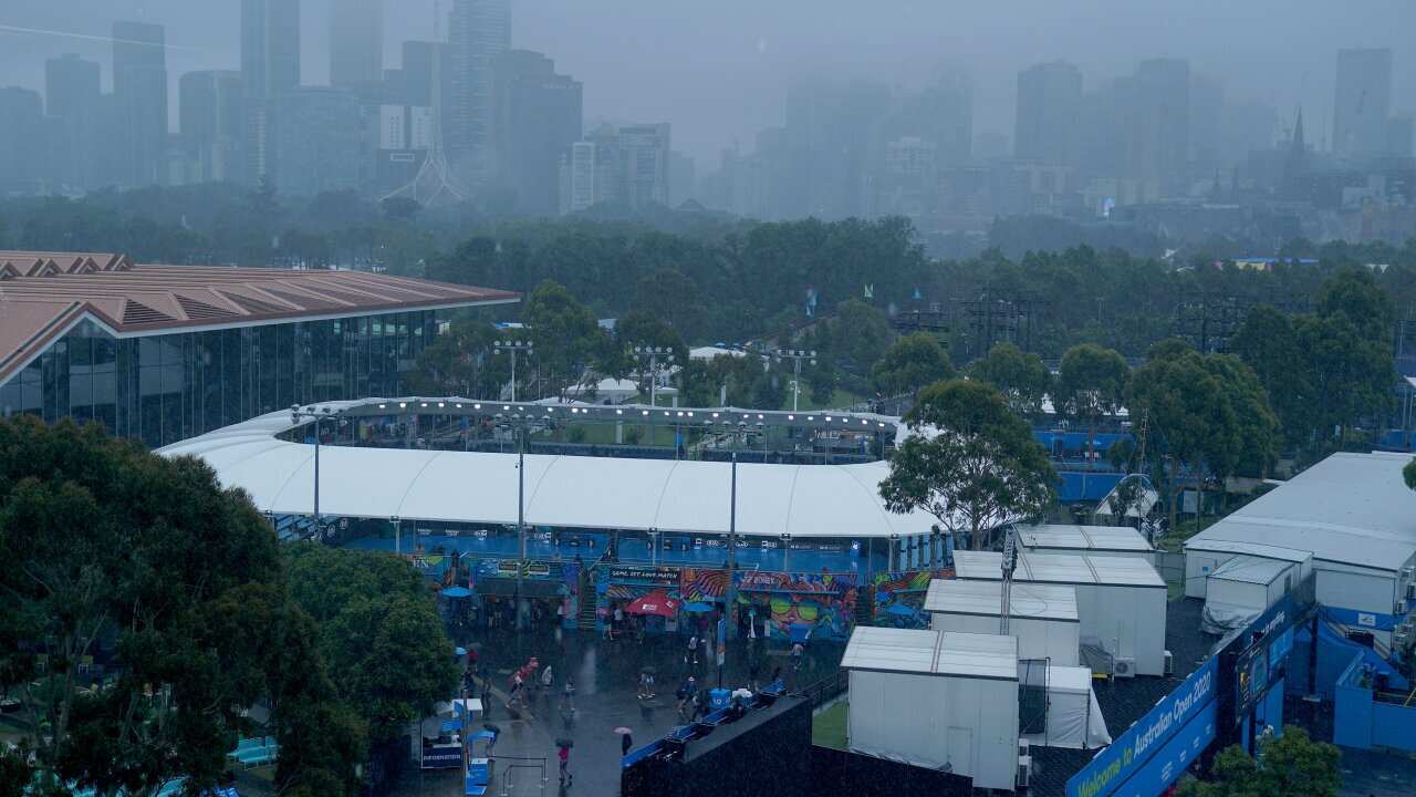 Rain falls over Melbourne Park.