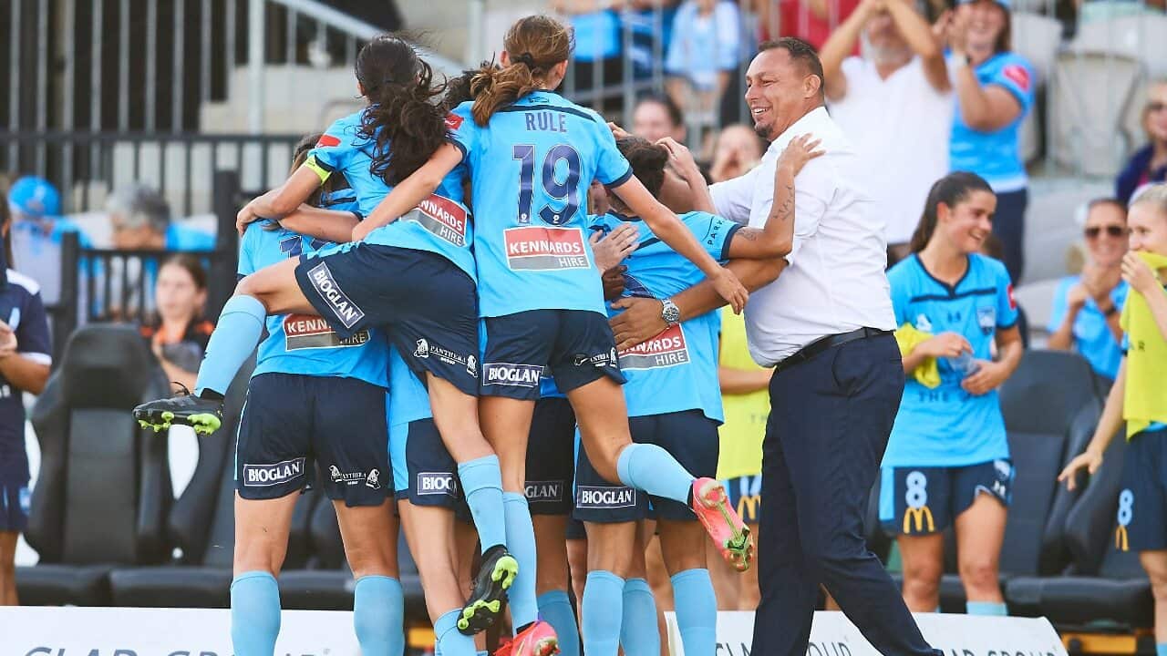 Sydney FC celebrate a goal in a W-League match