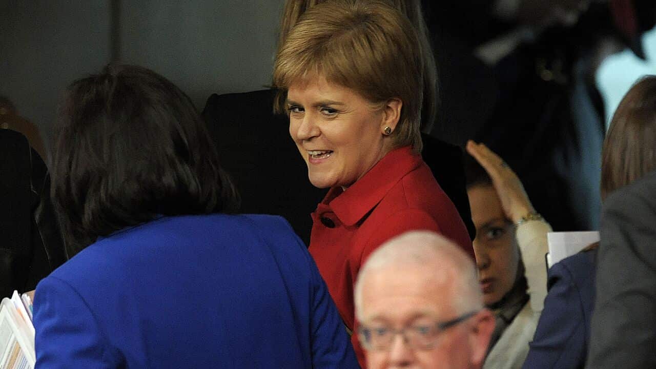 First Minister Nicola Sturgeon leaves after the vote on a second referendum on independence was carried at Scotland's Parliament in Holyrood, Edinburgh.
