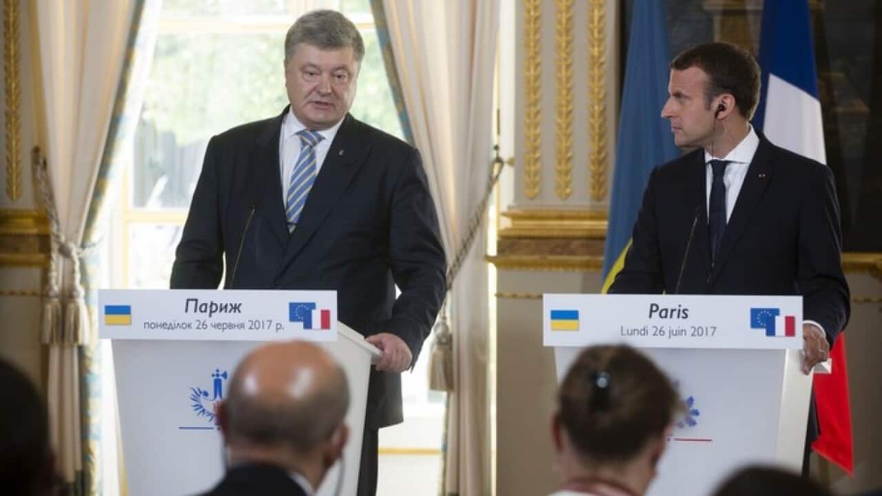 Ukrainian President Petro Poroshenko and French President Emmanuel Macron.