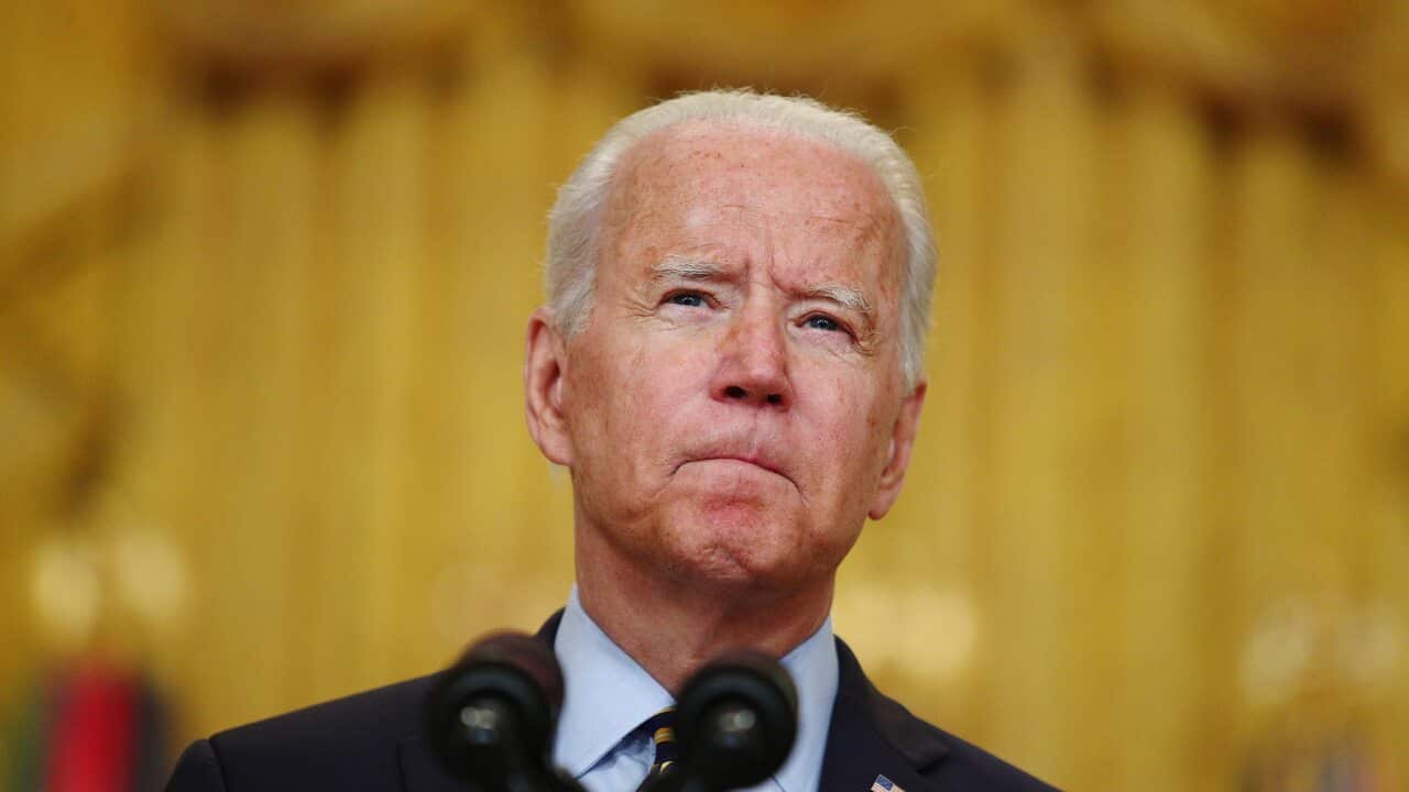 US President Joe Biden pauses while speaking in the East Room of the White House on Thursday, 8 July, 2021.