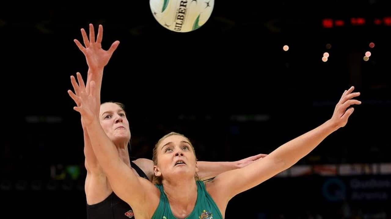 Liz Watson of the Diamonds competes for the ball.