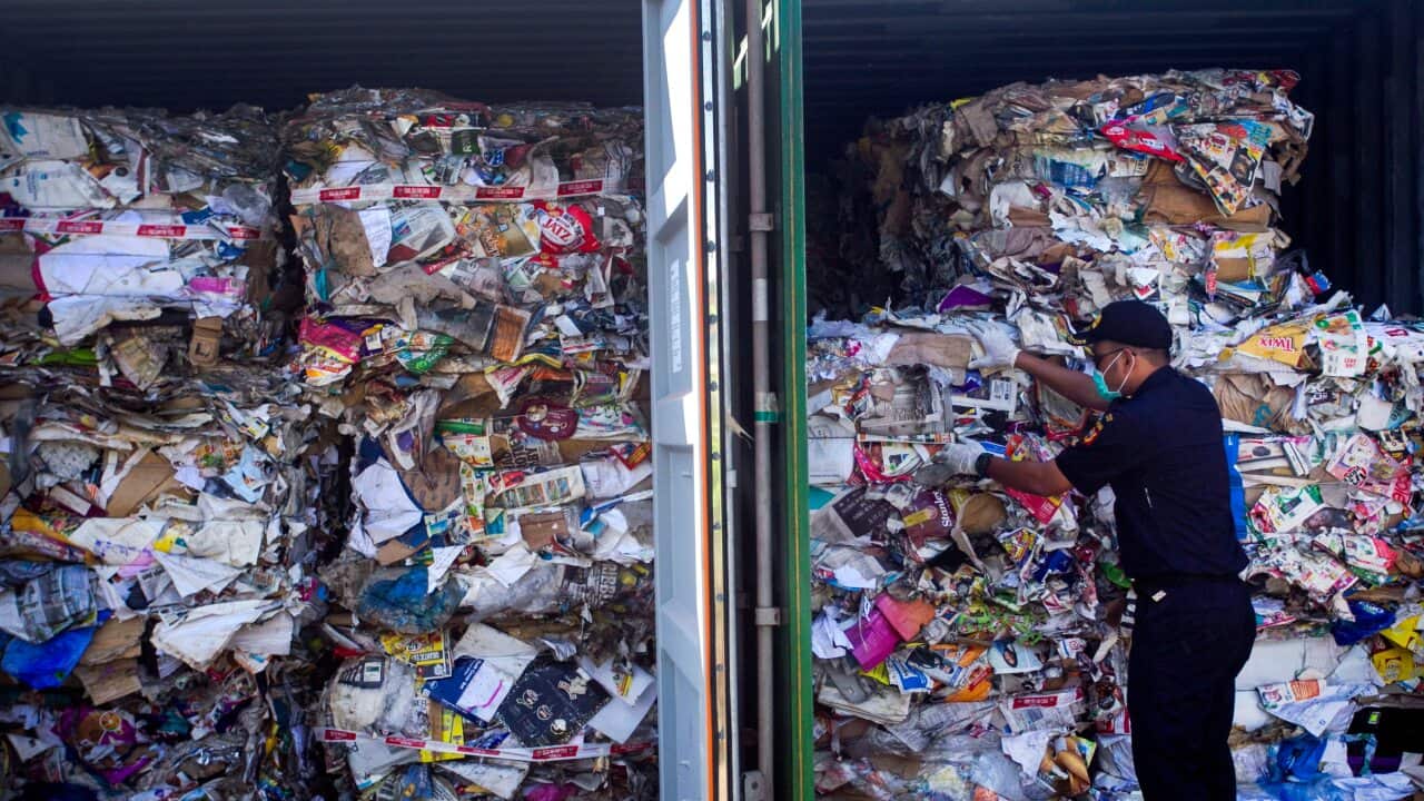 Containers loaded with a combination of garbage, plastic waste and hazardous materials from Australia at Tanjung Perak port in Surabaya.