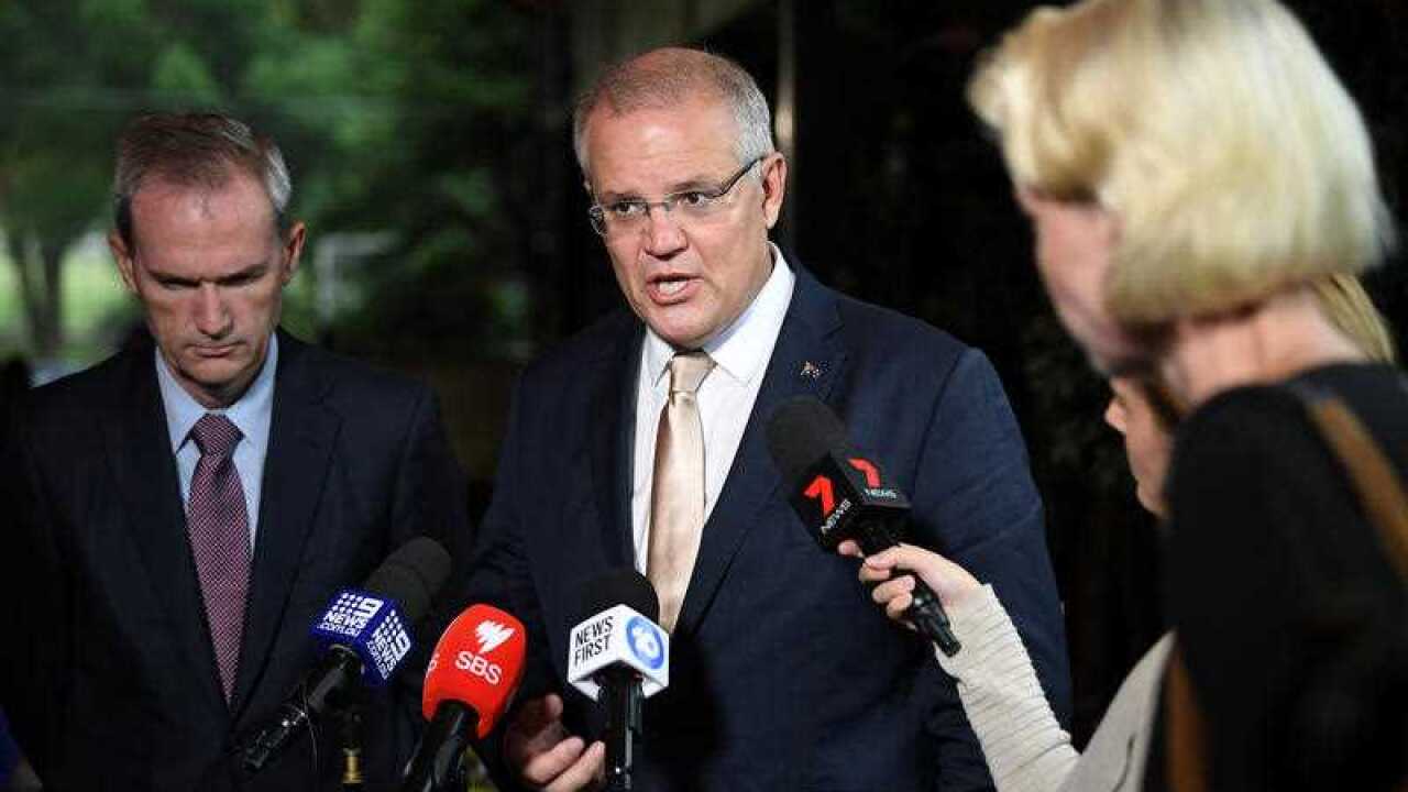 Immigration Minister David Coleman (left) and Prime Minister Scott Morrison.