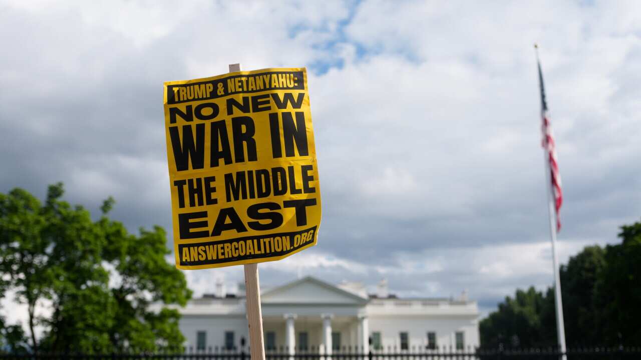 DC: Workers construct a 100-foot flag pole on the North Lawn of the White House
