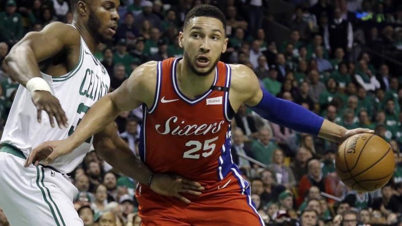 Ben Simmons drives against Semi Ojeleye.