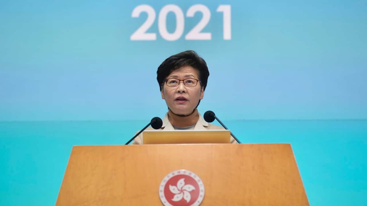Hong Kong Chief Executive Carrie Lam listens to reporters' questions