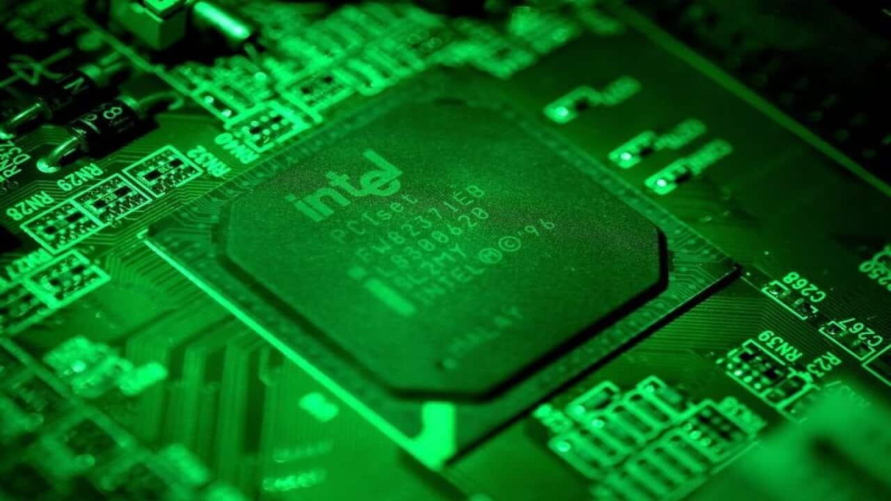 A close-up photo showing an Intel computer circuit board